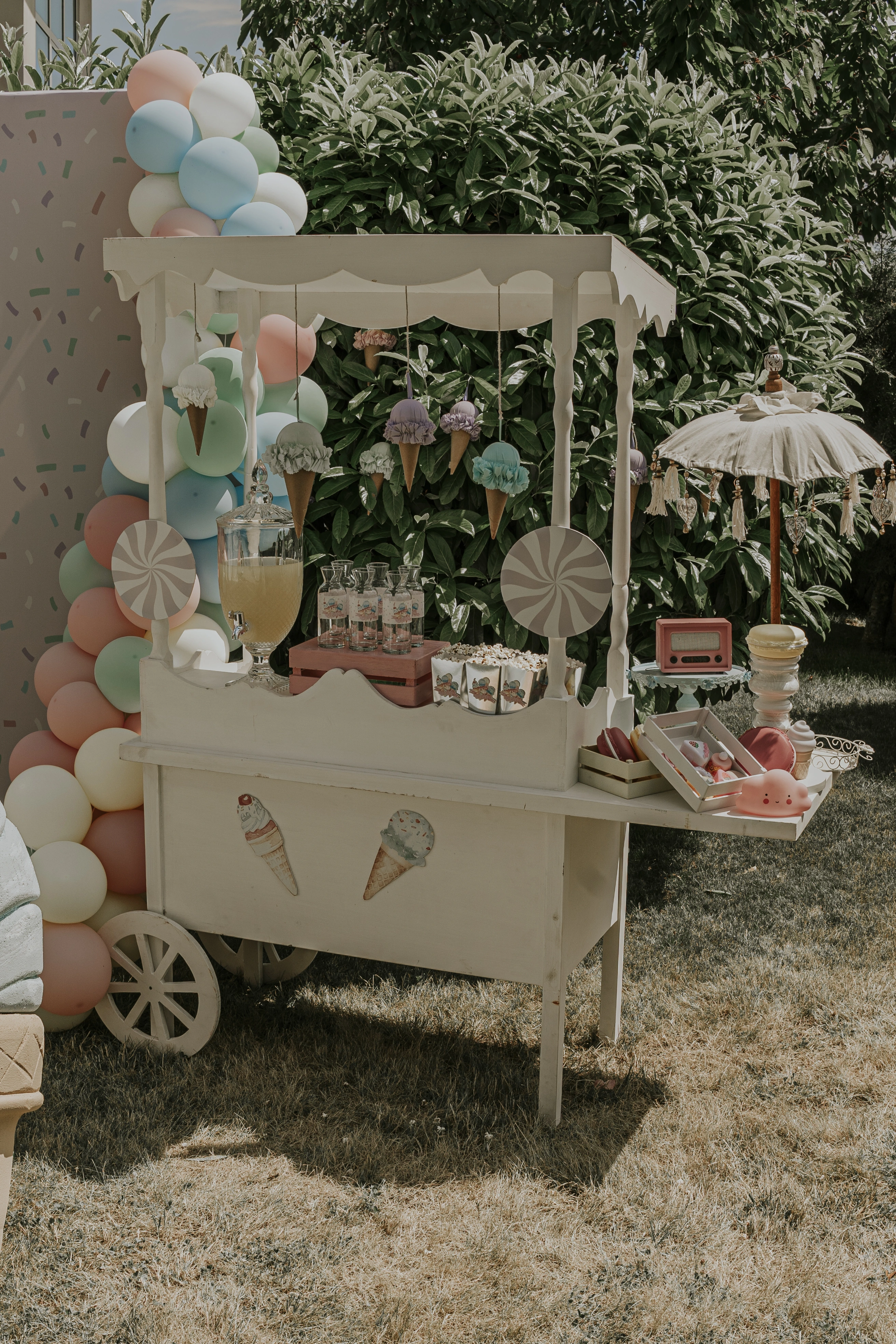 Pastel ice cream cart and dessert displays