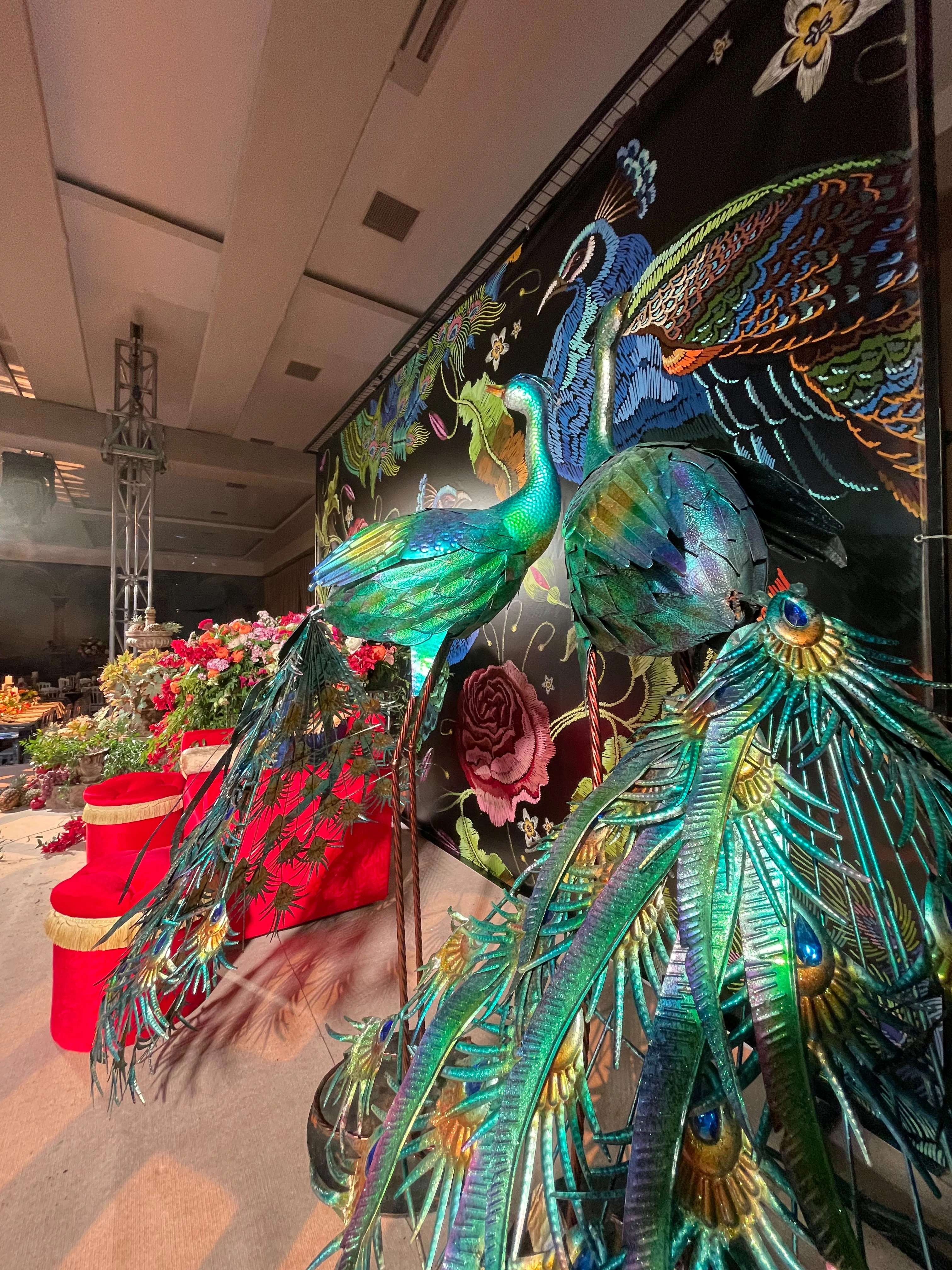 Henna night stage with peacock motifs and flowers